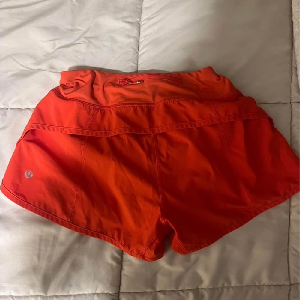 Orange / red lululemon shorts